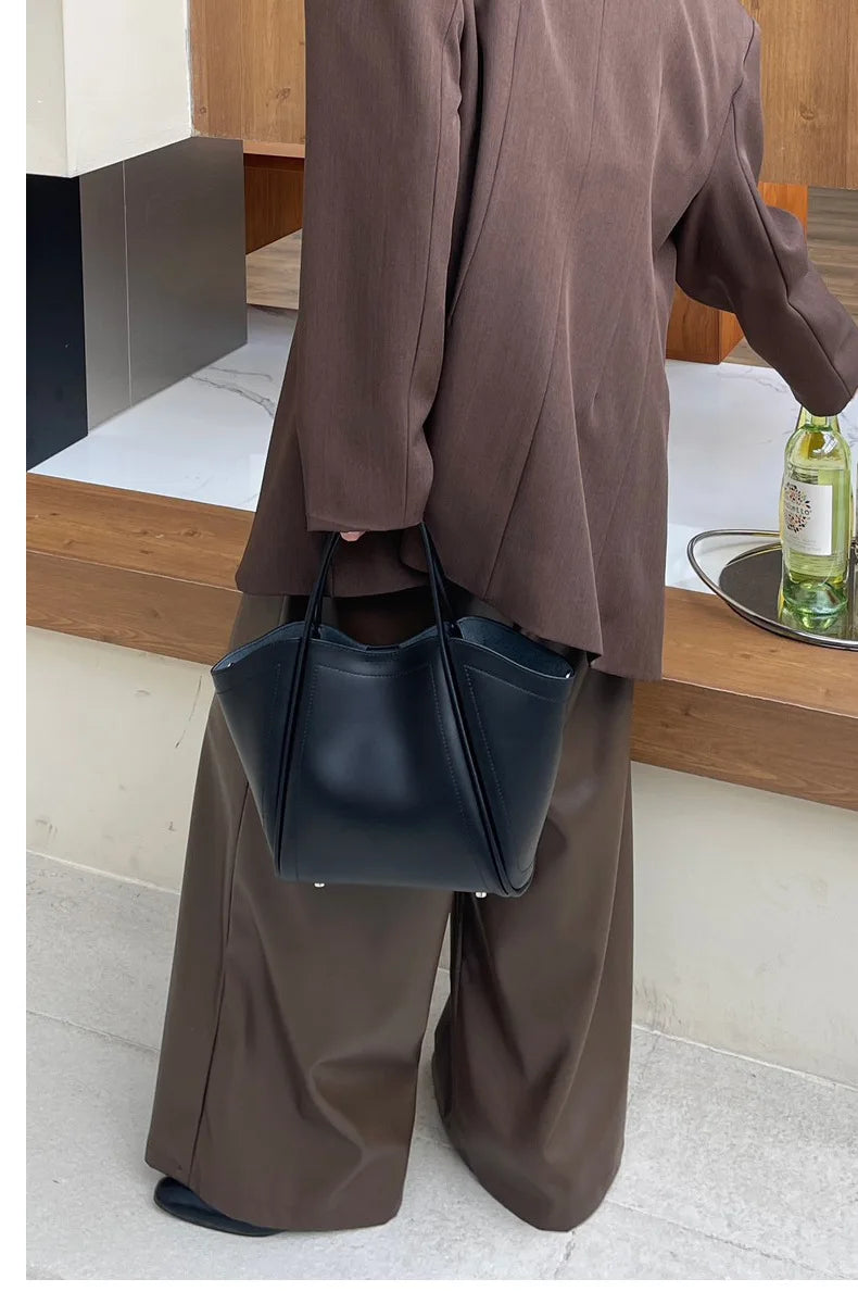 2025 Autumn Winter High-End Niche Genuine Leather Wing Bag Large Capacity Commuter Shoulder Promotional Drawstring Sportpacks