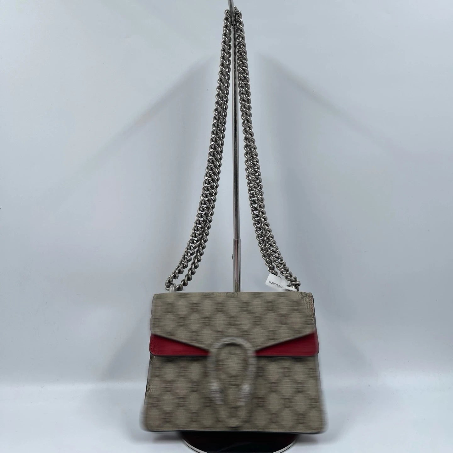 Pre-owned designer shoulder bag in beige monogram canvas with red leather trim and silver chain strap.