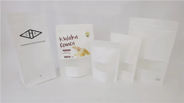 White padded paper mailer bag with corrugated honeycomb cushioning, stacked