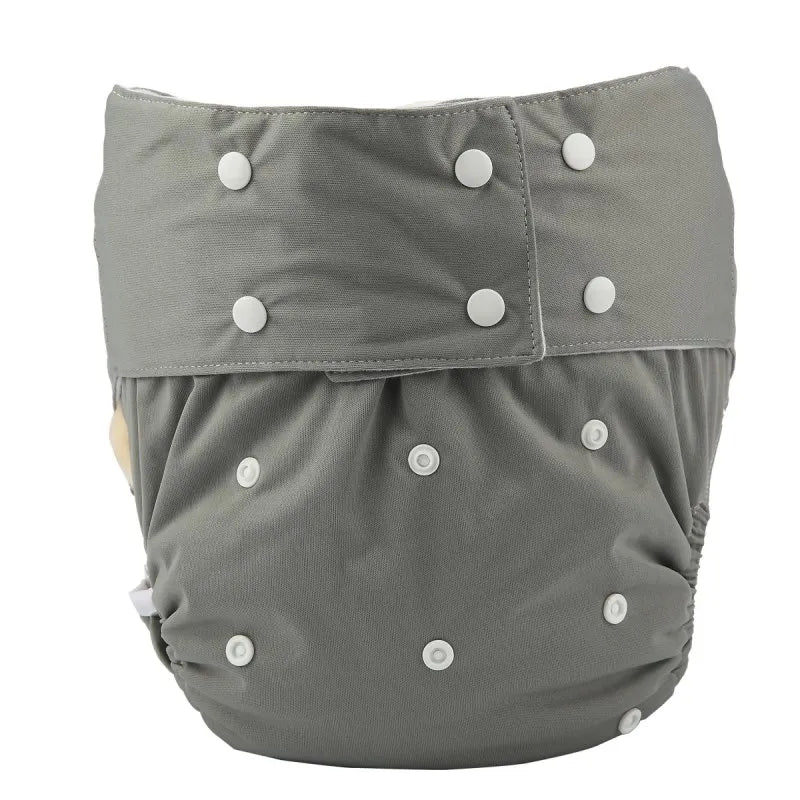 Gray reusable cloth baby diaper with adjustable snap closures for a customizable fit.