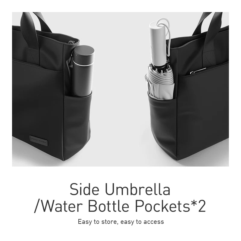 Mark Ryden black designer tote bag featuring two convenient side pockets for a water bottle and compact umbrella.