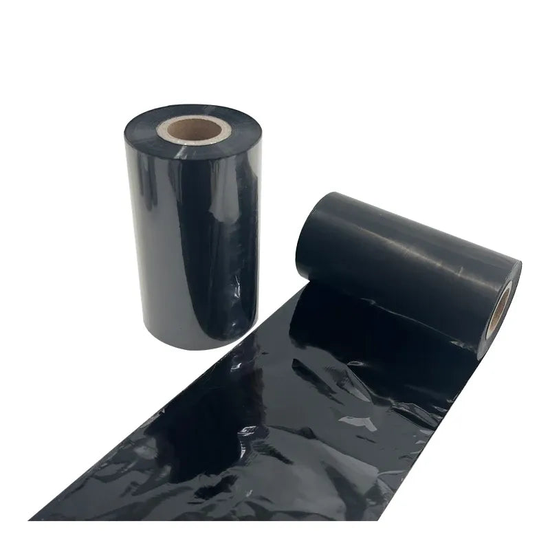 Black thermal transfer ribbon roll with shiny film and visible cardboard core