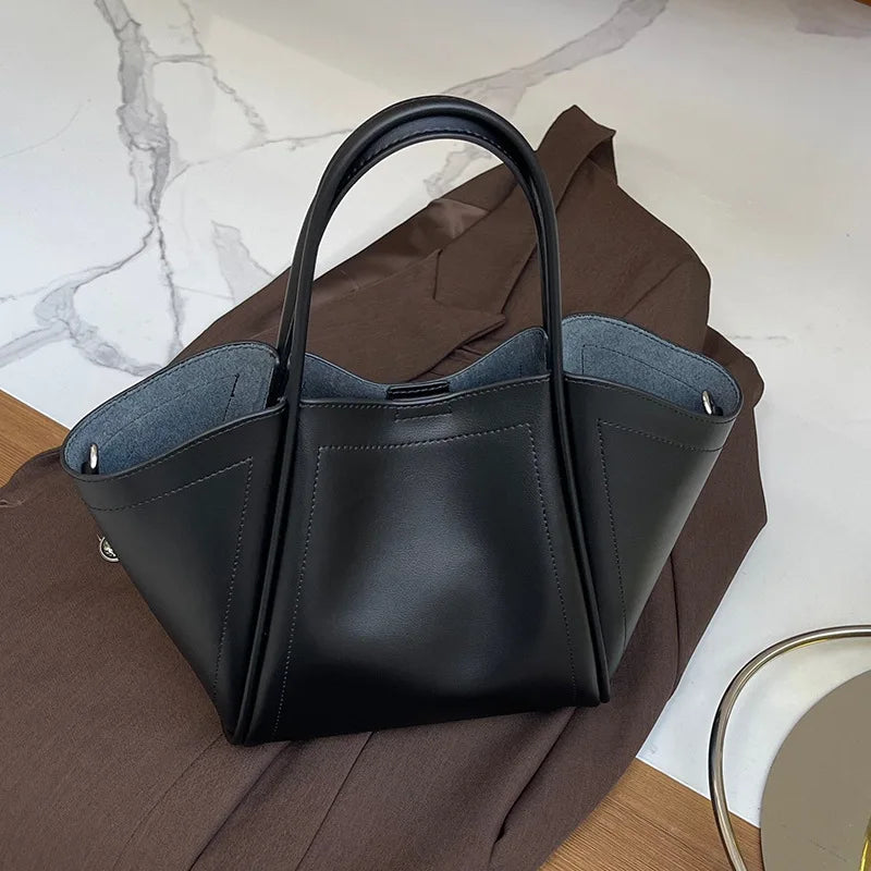 2025 Autumn Winter High-End Niche Genuine Leather Wing Bag Large Capacity Commuter Shoulder Promotional Drawstring Sportpacks