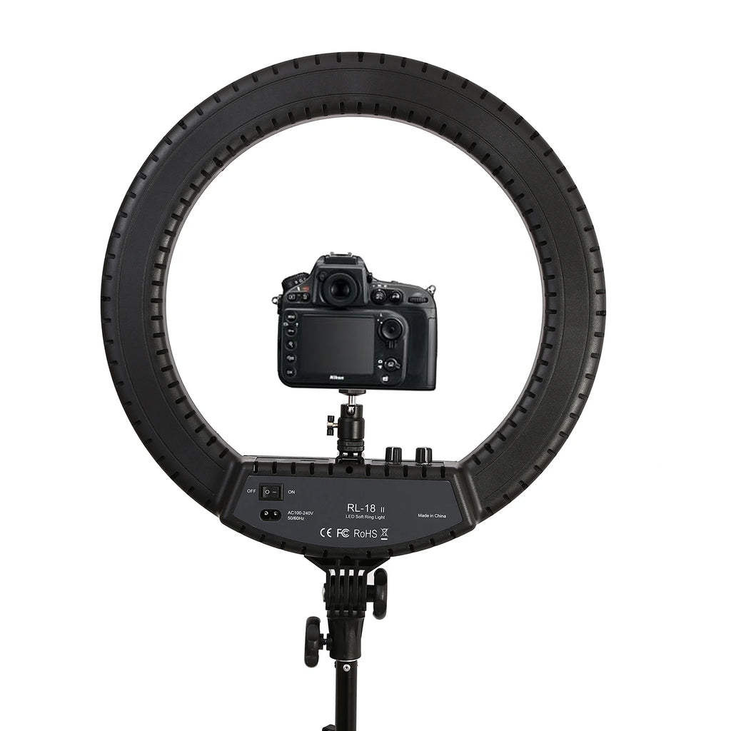 Black 18-inch LED ring light on a stand with a centered digital camera mount for photography and video lighting.