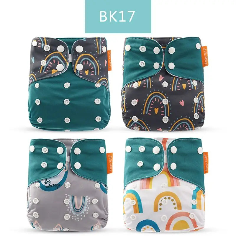 Four Happy Flute adjustable cloth diapers with colorful rainbow patterns and snap closures for baby care.