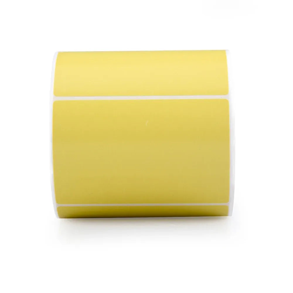 Waterproof label stickers roll with yellow rectangular printed sections, stacked tape