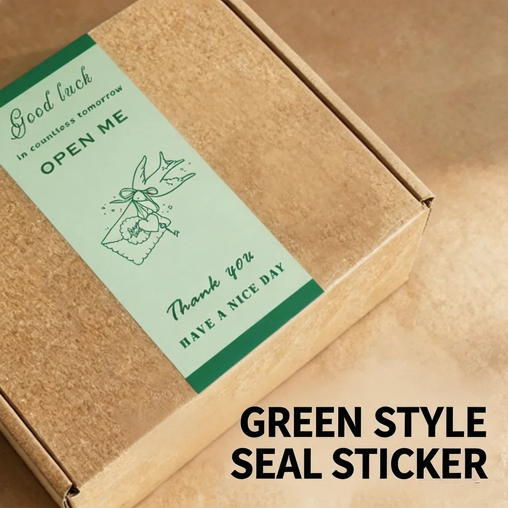Green style “Good luck” “OPEN ME” rectangle seal sticker on a kraft box