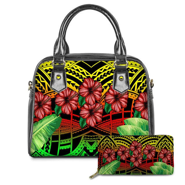 Polynesian tribal print leather handbag and wallet set with vibrant red hibiscus flowers and yellow palm leaf patterns.
