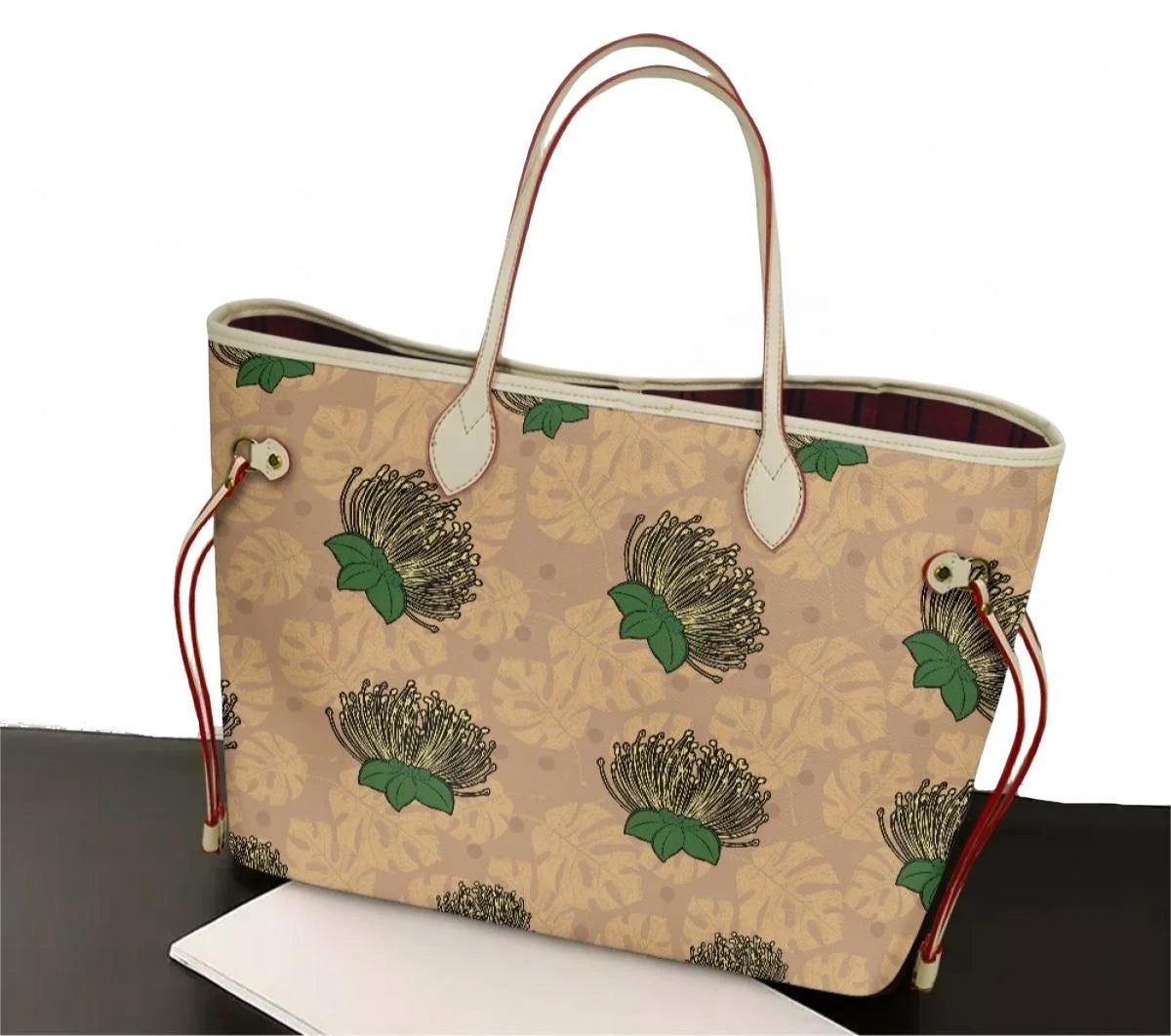 Designer leather tote bag featuring a beige Ohia Lehua tropical floral print with red accents and white handles.