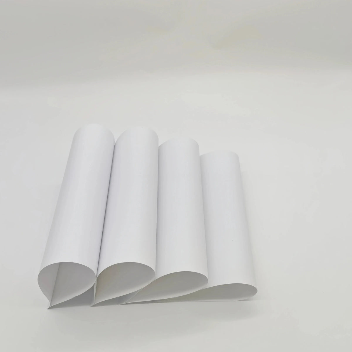 White A4 printable label sheets, rolled stack