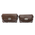Two brown genuine leather designer shoulder bags with silver chain straps and metal buckle closures.