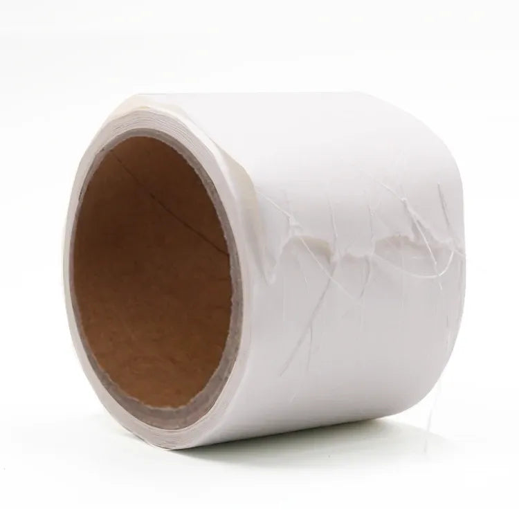 White reinforced kraft paper tape roll with visible paper texture and core