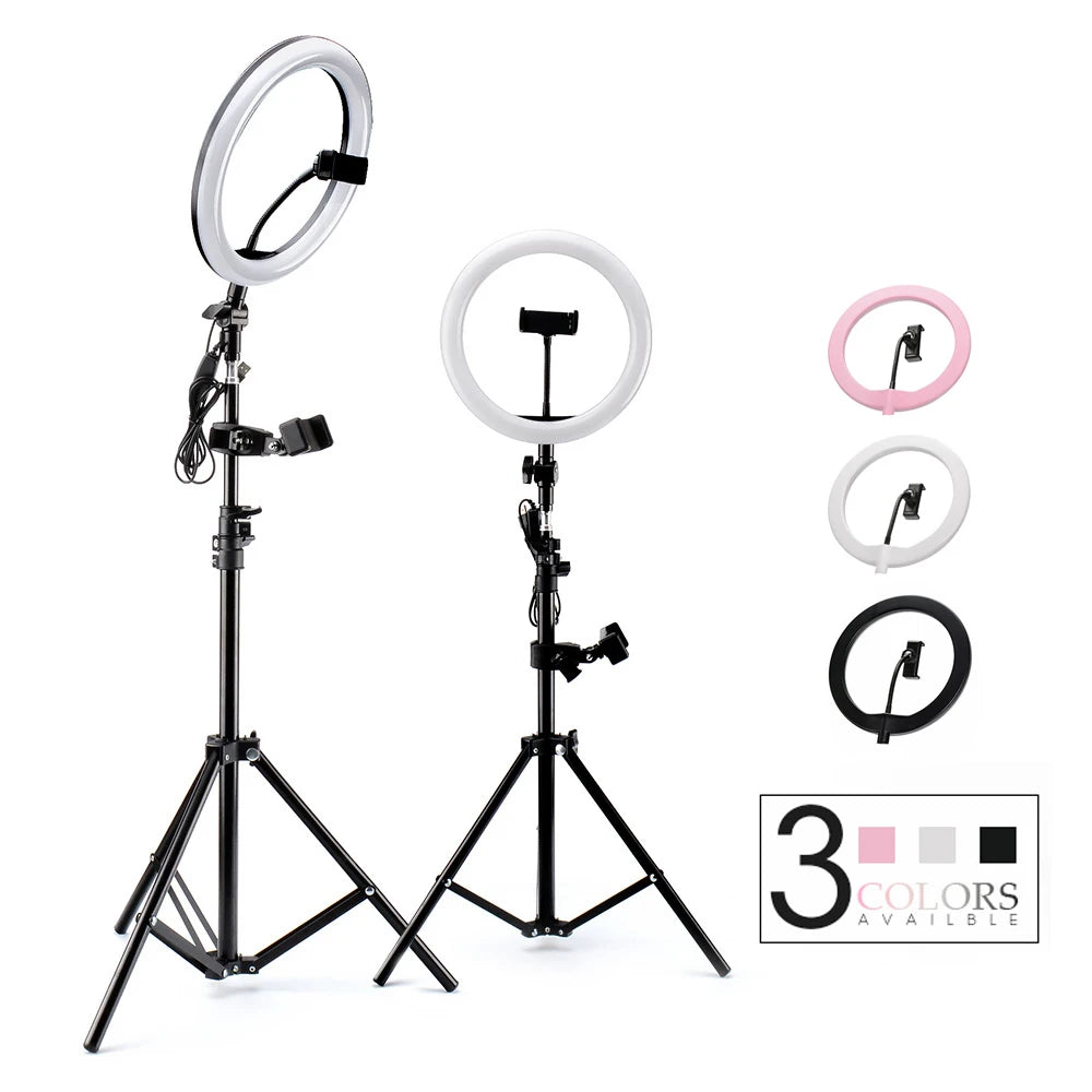 Ring light with phone holder on adjustable black metal tripod stand, available in pink, white, and black for