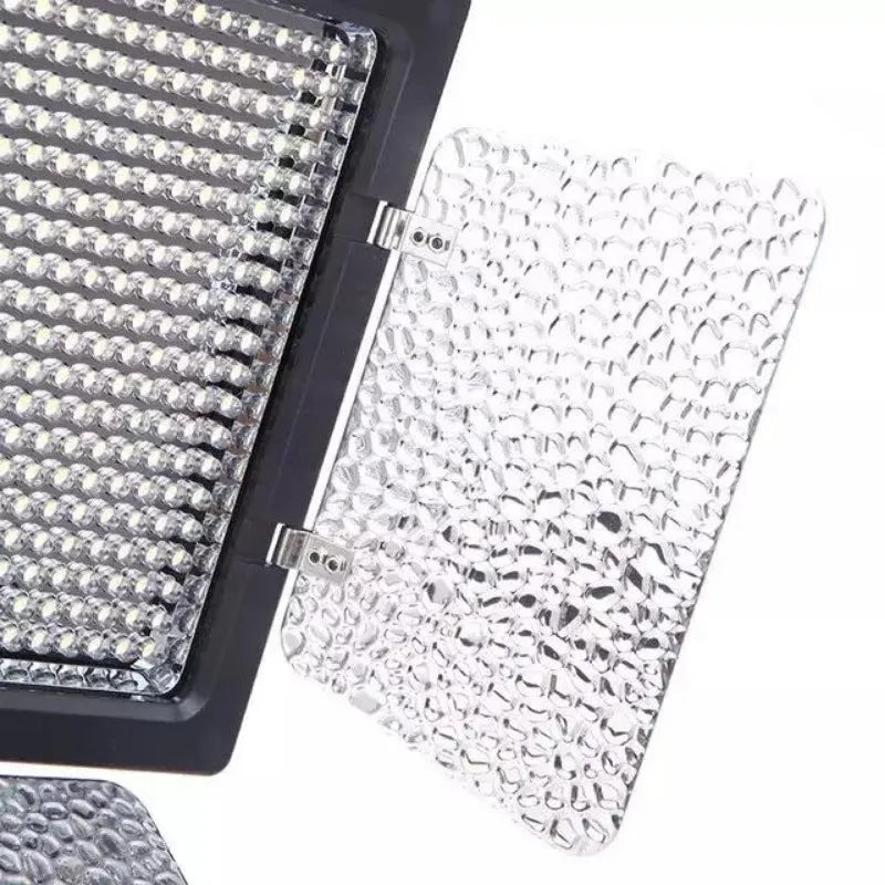 LED video light panel with a black frame and a detachable, textured clear plastic diffusion filter.