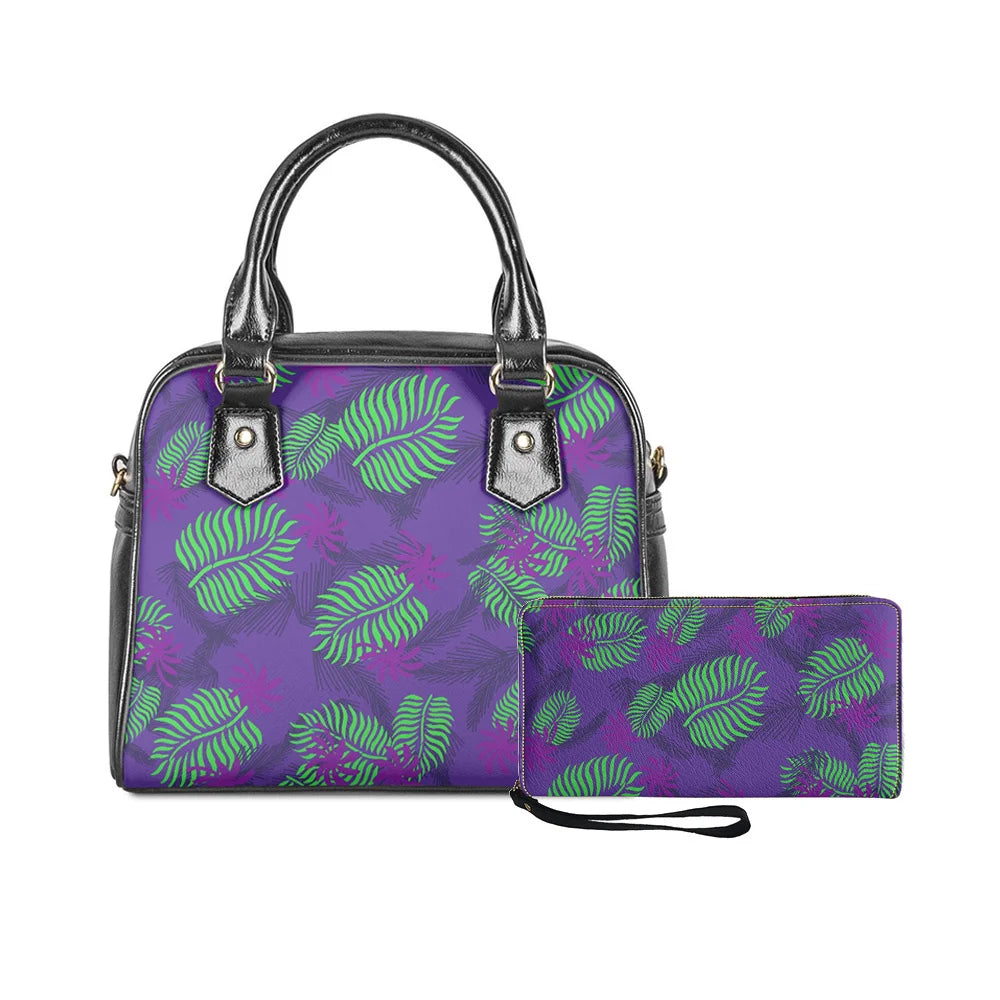 2-piece handbag and wallet set in purple with green tropical leaf print, black leather trim, and structured trunk style.