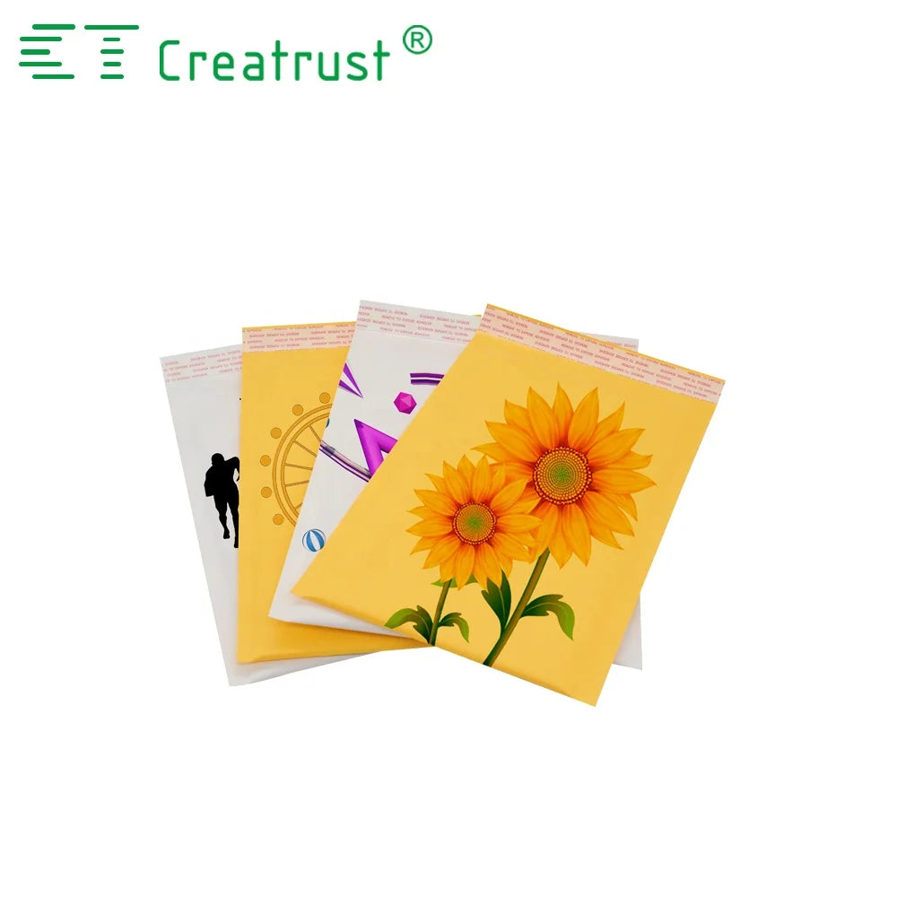 Yellow custom printed padded mailer envelopes with floral artwork on the front