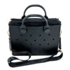 Black waterproof EVA tote bag with clog-style charm holes, double handles, and detachable shoulder strap. Trunk style.