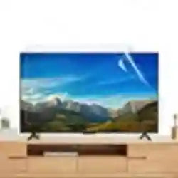 Clear, rectangular plastic screen protector film being applied to a flat-screen TV display.