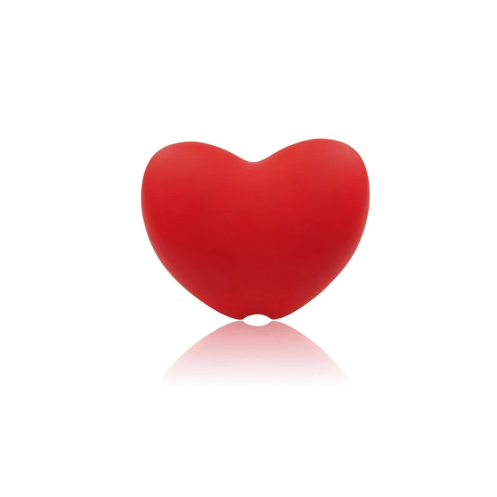Red heart-shaped silicone baby teething toy for soothing sore gums.