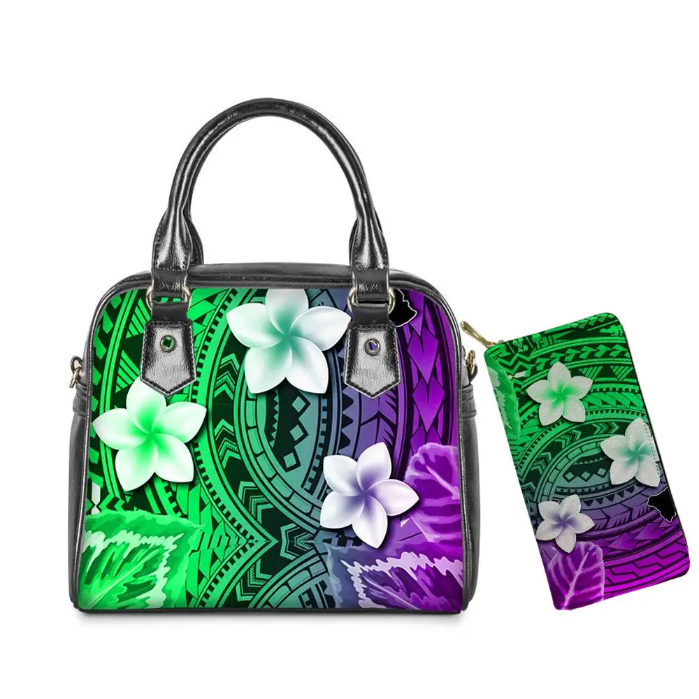 Colorful Polynesian tribal print leather handbag and wallet set with plumeria flowers, green and purple gradient.