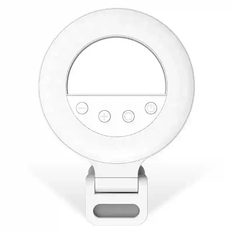 Small white circular clip-on LED ring light for smartphones with brightness and power control buttons.