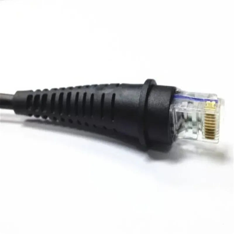 Close-up of molded RJ45 Ethernet connector on black USB to RJ45 cable