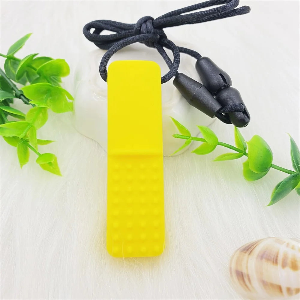 Yellow silicone teething toy for baby teething relief on a black cord.