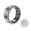 Silver smart ring with internal biometric sensors and a matching charging disc on a white background.