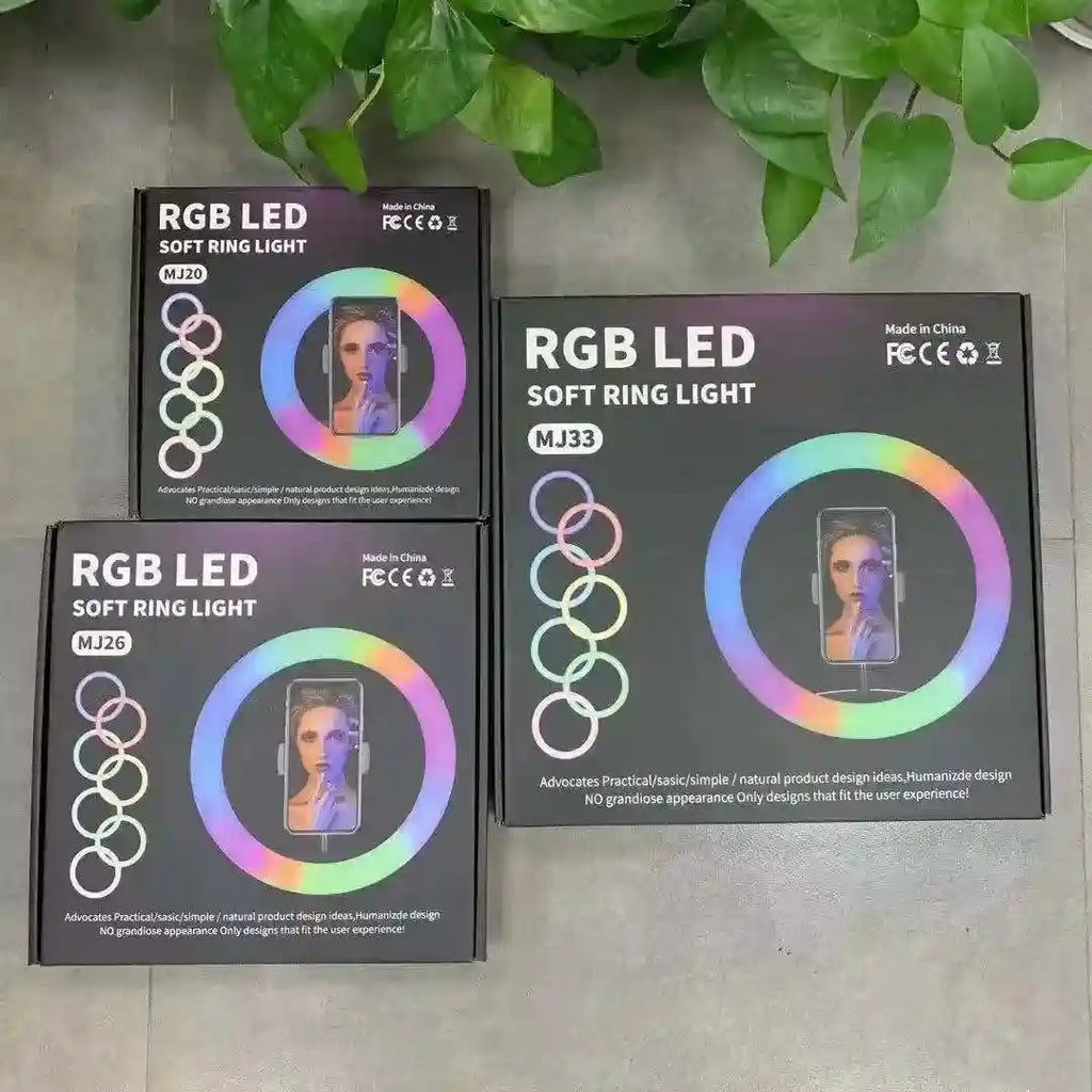Three black boxes containing circular RGB LED ring lights for photography and phone mounting in MJ20, MJ26, and MJ33