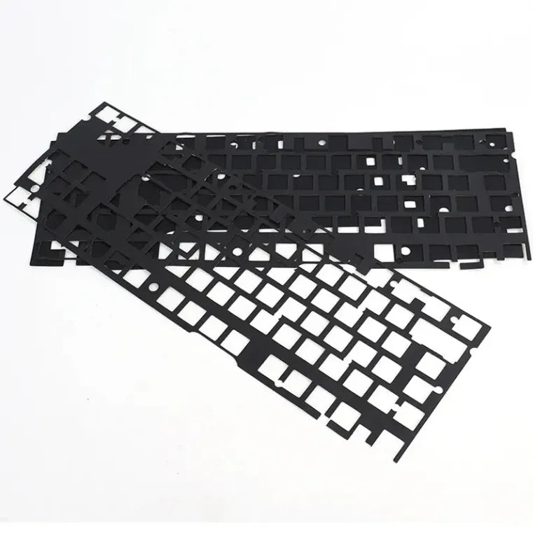 Black urethane foam tape panel with grid of rectangular cutouts