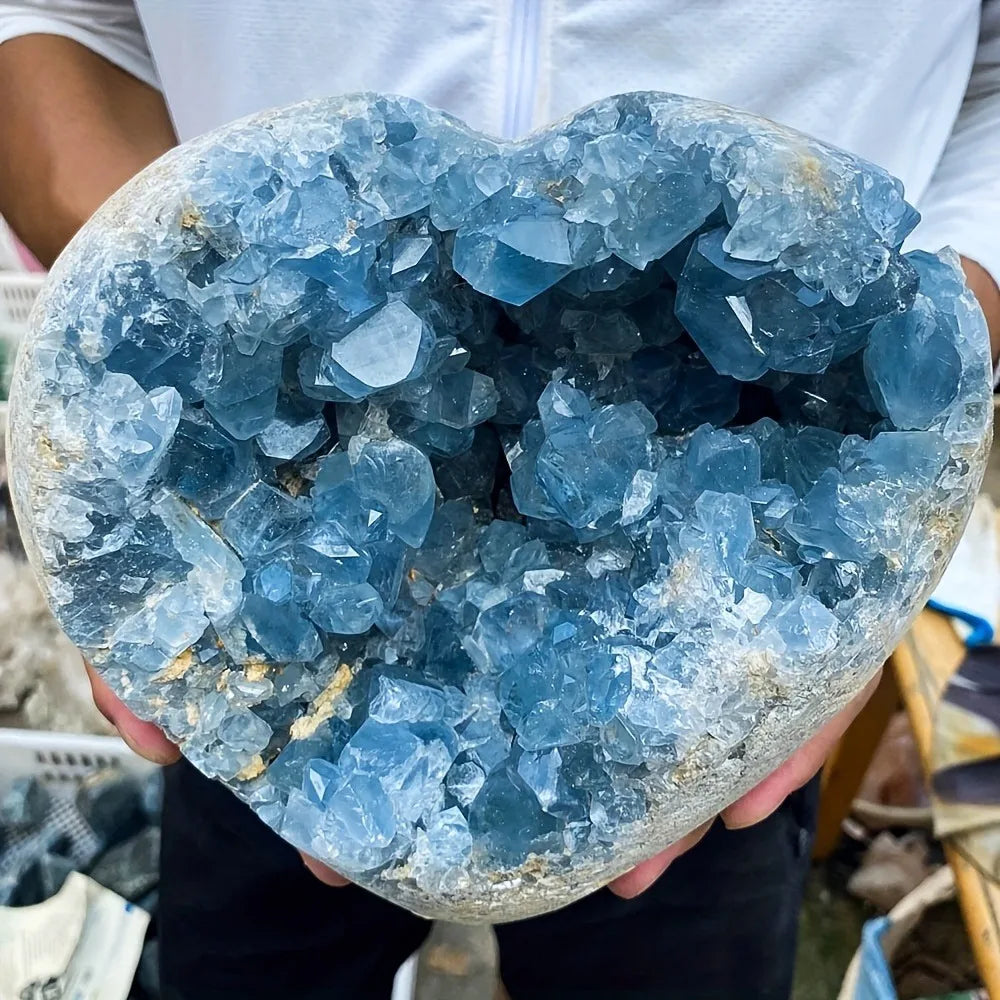 Blue celestite geode heart with dense glittering crystal formation