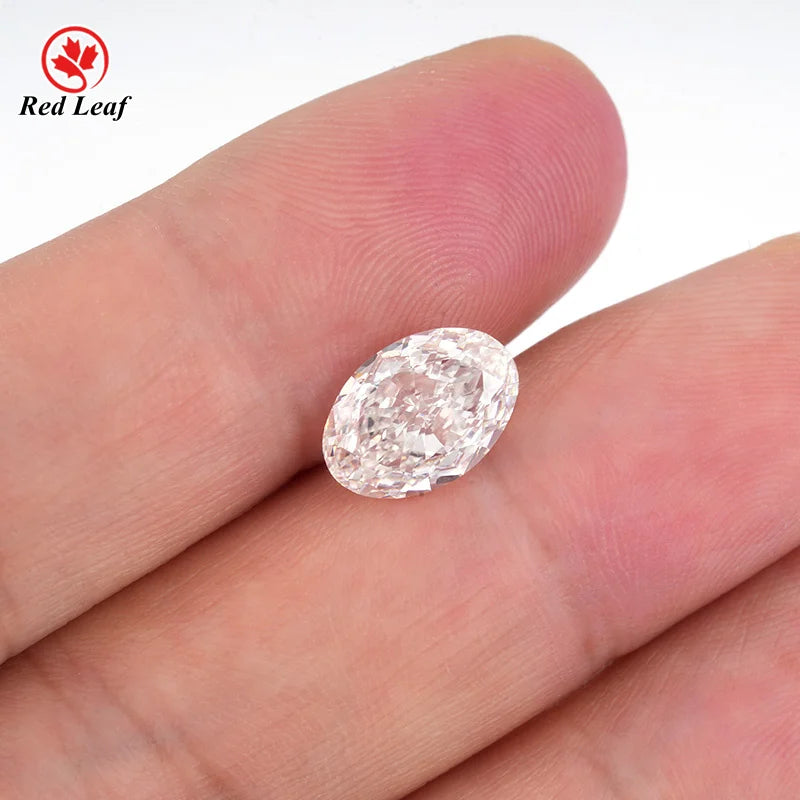 Oval lab-grown diamond with a pink tint, faceted loose gemstone