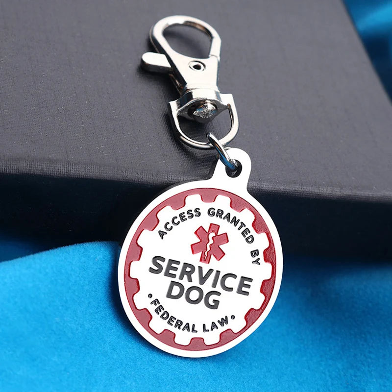 Durable metal Service Dog ID tag keychain with red gear design for easy identification and federal law access compliance.