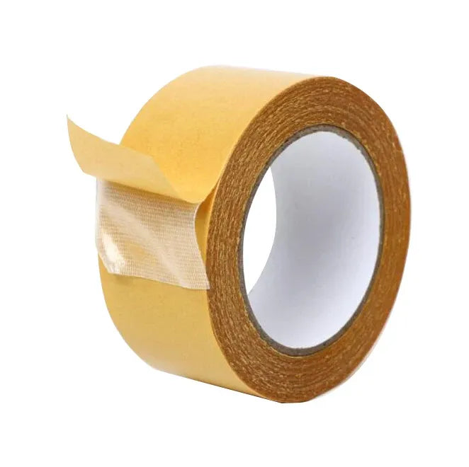 Tan-brown double-sided tape roll with lifted release liner and white inner core