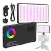 Rectangular RGB LED video light panel with charging cable and camera mount for photography and video production.