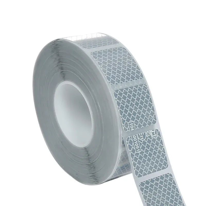 Reflective road safety tape roll, light gray silver strip with honeycomb pattern