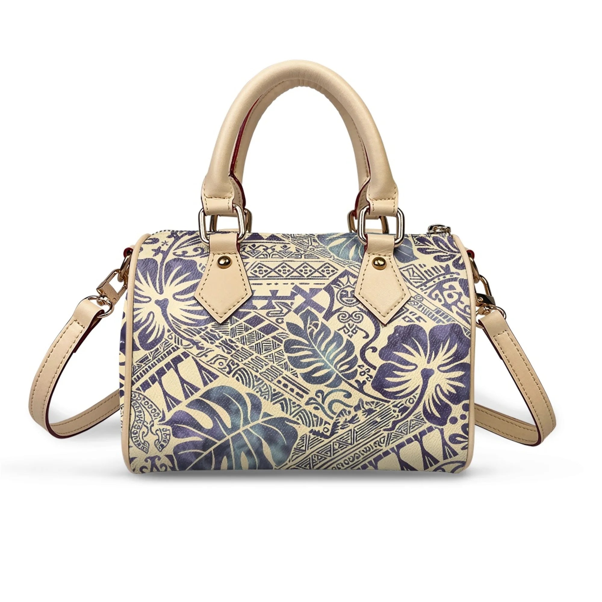 Pillow-shaped handbag with cream top handles, tribal and floral print, and removable strap. Casual luxury style trunk.