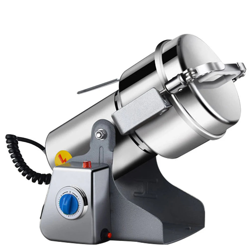 Industrial stainless steel electric grain and coffee grinder with tilt mechanism, timer dial, and silver finish.