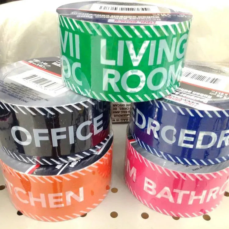 Colorful printed gummed paper sealing tape rolls stacked