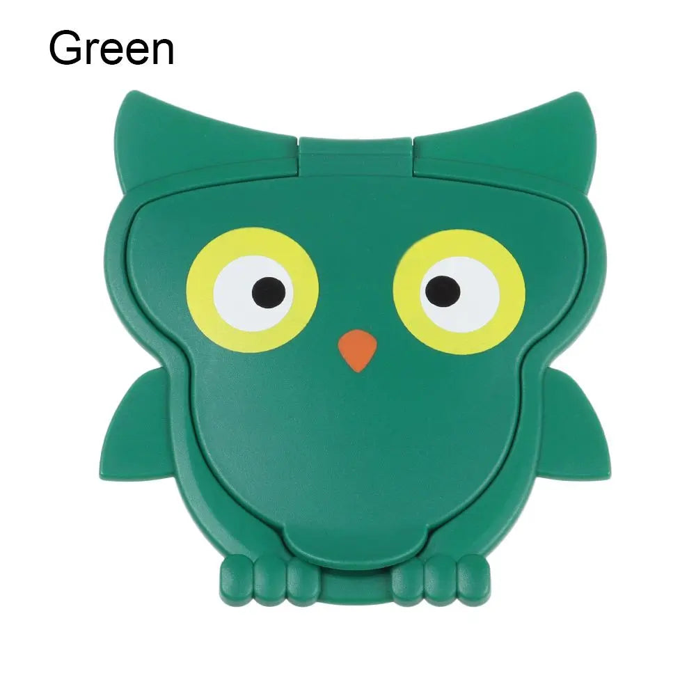 Green owl baby care wipe dispenser case for travel and nursery organization.