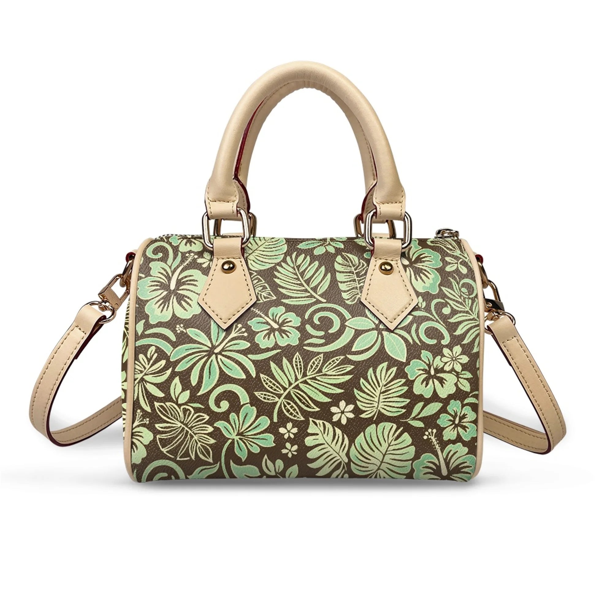 Pillow-shaped handbag with tropical floral print in brown and mint, featuring beige top handles and a shoulder strap.