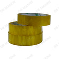 Yellow transparent packing tape rolls with clear printed liner on top