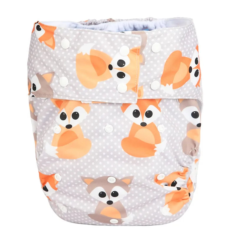 Reusable cloth baby diaper with orange and grey fox pattern on white polka dot background, adjustable snap buttons.