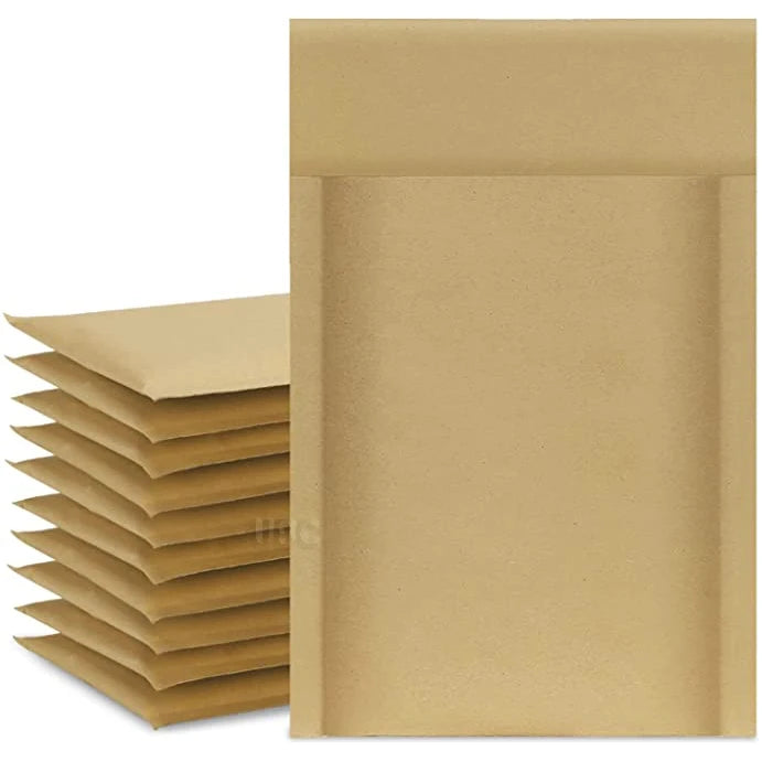 Brown kraft paper padded mailer envelope with flap closure, front view over stacked packs