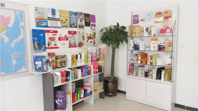 Shipping package display with boxed mailers on wall shelves