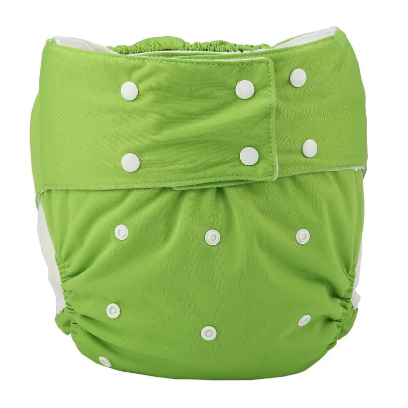 Reusable green cloth baby diaper with adjustable white snap buttons for custom sizing.