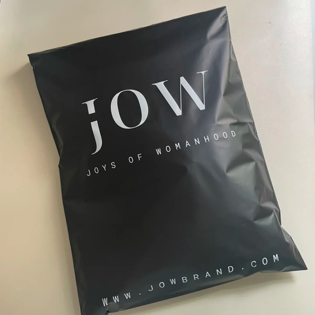 Black poly mailer shipping bag with white 'jow' logo and web address