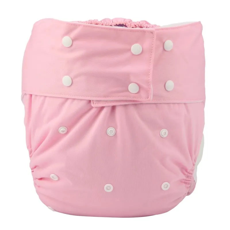 Solid pink reusable baby cloth diaper with adjustable snap buttons for a customizable fit.