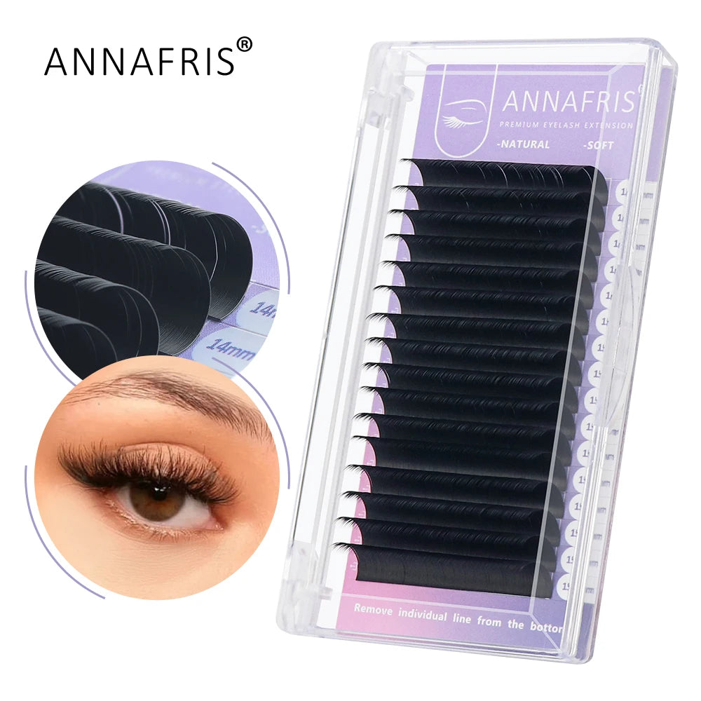 Black individual eyelash extension strips in a rectangular clear plastic tray for professional beauty application.