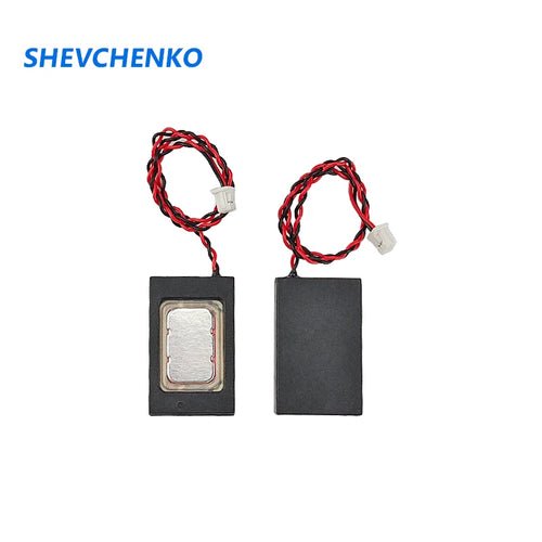 Compact rectangular speaker modules with red/black wires and white connectors, black housing.